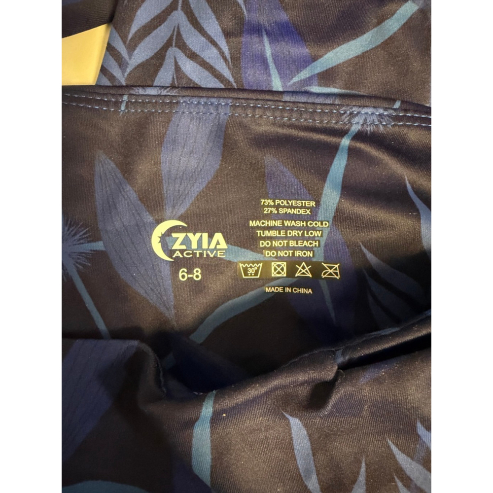 Women's ZYIA ACTIVE Blue Navy Tropical Print Hi-Rise Capri Leggings SZ 6-8 New - Picture 12 of 16